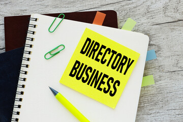 Online Directories text on business sticker on wooden background