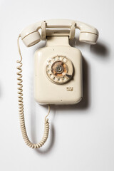 Old telephone isolated white background
