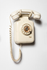 Old telephone isolated white background