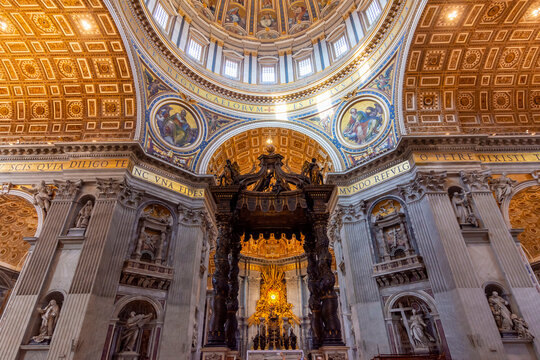 Vatican - October 2022: Baldachin over main altar with Saint Peter's tomb in St. Peter's basilica
