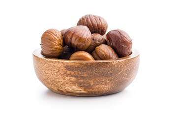 Peeled chestnuts. Sweet roasted chestnuts in bowl isolated on white background.