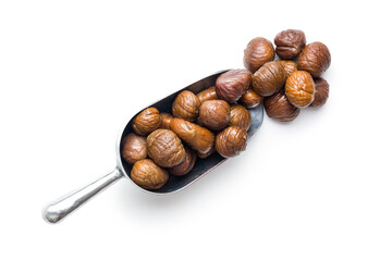 Peeled chestnuts. Sweet roasted chestnuts in scoop isolated on white background.