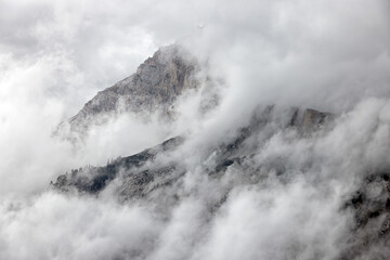 Naklejka na ściany i meble Stormy clouds over Cristallo mountains in the Dolomites, Italy, Europe