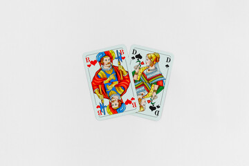 poker playing cards on a white background, man and woman. valentines day. love
