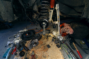 Car service repair of the front wheel hub, replacement of bearings and oil seals, maintenance of a...