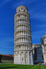 a shot of the Leaning Tower of Pisa. High-resolution shot of the Leaning Tower of Pisa, one of the most important tourist symbols of the world. Text space is available. Shot with polarize filter.