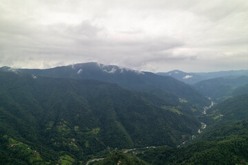 Naklejka premium aerial view of foggy forests. Drone shot of the Kackar Mountains in spring. Camlihemsin Rize, Turkey