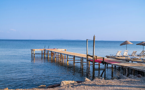 an old wooden pier by the sea. Sea views. Peaceful sea pictures and wallpapers