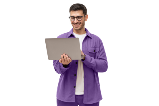Young man holding laptop surfing, browsing online, typing message or watching movie