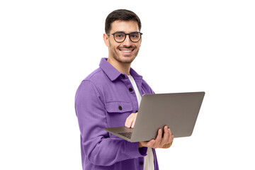 Portrait of young modern business man standing in casual purple shirt, holding laptop and looking at camera with happy smile - obrazy, fototapety, plakaty