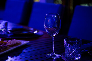 Delicious, beautiful slicing,appetizer on the table in a restaurant, in neon lighting