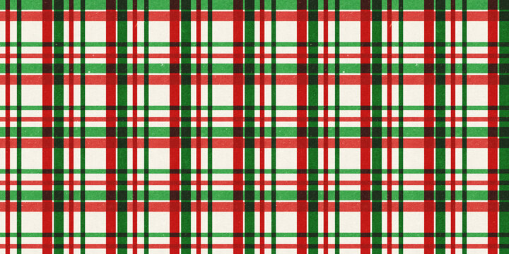 Red and green vintage rough kraft textured seamless tartan or plaid stripes Christmas decoration pattern. Classic xmas card background or gift wrap, wrapping paper or, winter holiday backdrop.