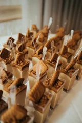 Tuinposter Vertical shot of sweets on a wedding event © Alex226/Wirestock Creators