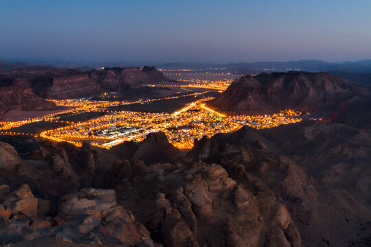 Aerial View Of Alula Town And Rock Formation Against Sky.