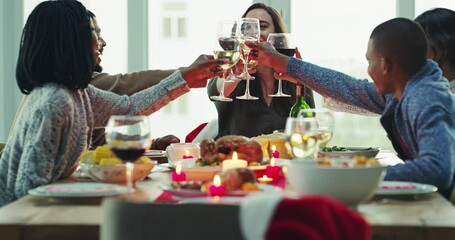 Dinner, friends and toast with wine in home for thanksgiving celebration. Cheers, champagne and group of people bonding drinking alcohol, fine dining or having buffet with chicken or turkey in house.