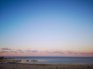 Beautiful beach,sea, sky and pink clouds. Gdynia