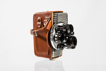 8mm Movie Camera. Vintage old video camera isolated on white