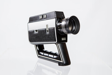 8mm Movie Camera. Vintage old video camera isolated on white