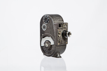 8mm Movie Camera. Vintage old video camera isolated on white