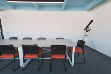 Photo of a modern office where programming, digital marketing and web design projects are done. Office with modern furniture and glass office