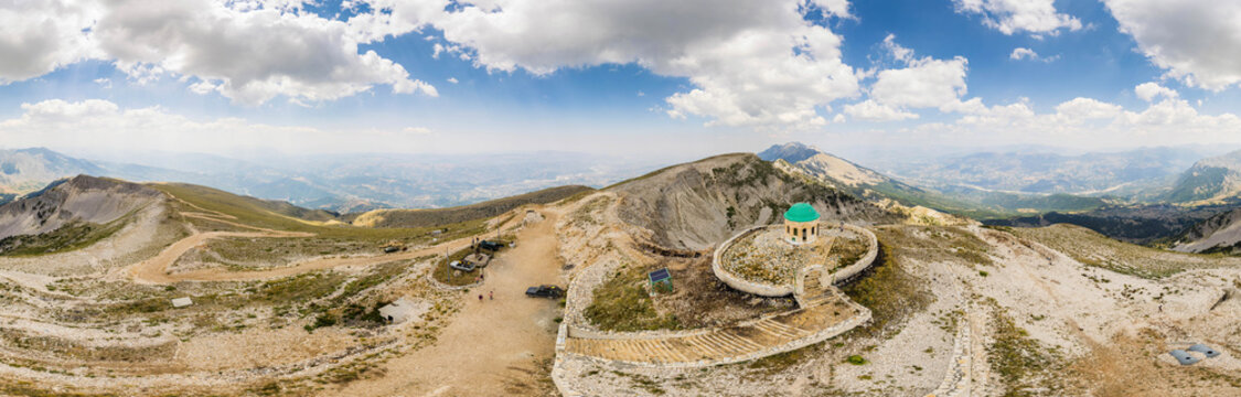 Drone panorama of Mount Tomorr in the Tomorr National Park with Shrine (tyrbe) of Abbas ibn Ali on the top in Summer, Albania
