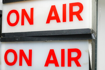 Old On Air sign for live taping