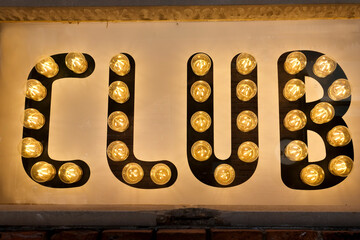 Close-up of illuminated club sign