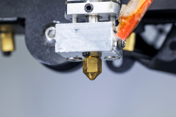 Close-up of a 3D printer printhead, hotend and extruder from a 3D printer