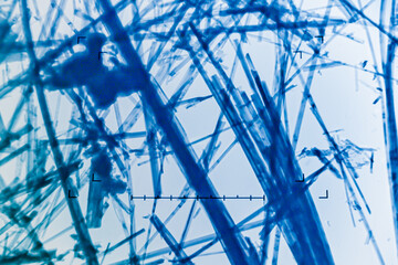 Environmental laboratory, crocidolite fibers (asbestos variety called blue asbestos) seen on the fluorescent screen of a transmission electron microscope, 20000 times magnification, standard sample