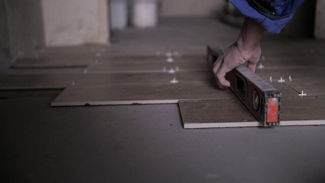 laying of ceramic tiles at the construction site