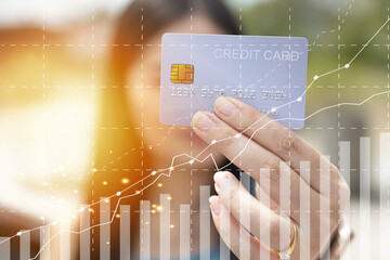 Fototapeta na wymiar Closeup hand takes of credit card for financial transactions