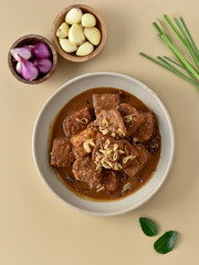 Semur Tempe or Tempeh stew, family favorite dish. Has a sweet and savory taste. Tempeh cooked with soy sauce, then served with a sprinkle of fried onions.
