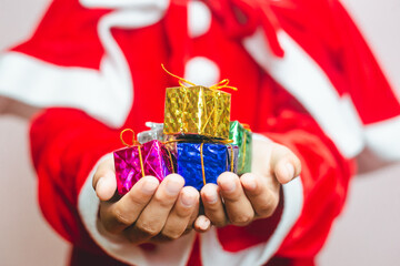 santa claus with gift boxes