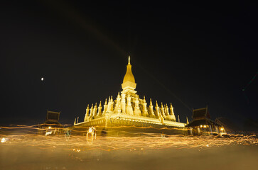 Naklejka premium Pha That Luang festival Vientiane, Laos. That-Luang Golden Pagoda in Vientiane, Laos. This place is history of laos and Pha That Luang is know to foreign tourists.