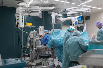 an operation is performed in an operating room