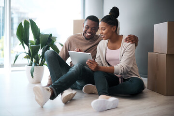 African couple, real estate and tablet for new house interior shopping, property or relax on floor...
