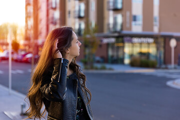 Fototapeta premium Young confident woman walking in the city