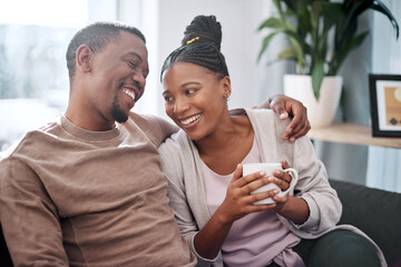Coffee, relax and black couple on sofa in home living room, bonding and talking. Love, tea and romantic man and woman speaking, discussion or conversation on couch in lounge or enjoying time together