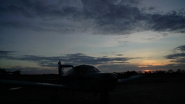 plane at sunset in the angar
