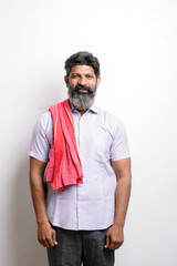 Indian farmer giving expression on white background.