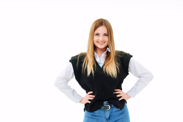 a blonde with sequins on face in a black knitted vest on a white background.