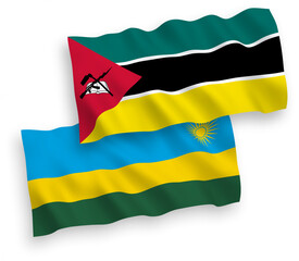 National vector fabric wave flags of Republic of Rwanda and Republic of Mozambique isolated on white background. 1 to 2 proportion.