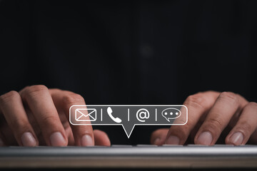 hand using smartphone typing, chatting on application Communication and conversation,mail working, in chat box icons pop up. Social media maketing technology concept.