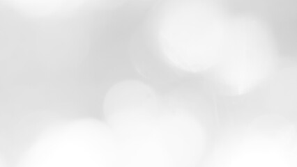 The illuminated white bokeh image can be used as a background illustration or add text.