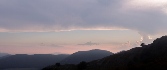 sunset on the mountain summit at miletto in matese park