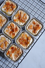 homemeade klappertaart topped with almond slice and cinnamon 