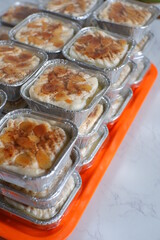 pile of food in aluminium foil cup