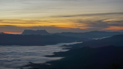 Fototapeta na wymiar Morning light with Doi Luang Chiang Dao and the sea of fog