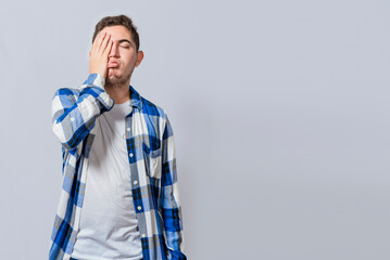 Exhausted person putting the palm of his hand on his face. Tired and exhausted man covering his face with the palm of his hand isolated, Concept of a bored and tired man