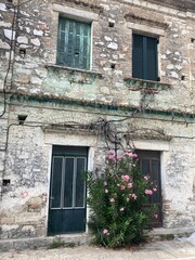 Fototapeta na wymiar traditional old street in Lefkimi village in Corfu, Greece